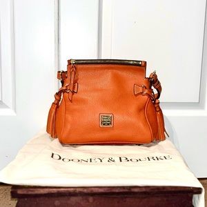 Authentic Dooney and Bourke Pebbled Grain Tangerine 
Tassel Bag